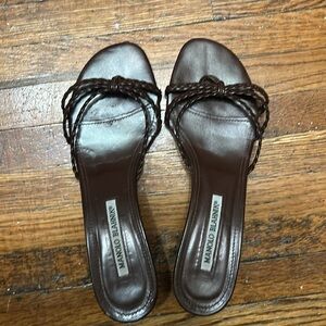 Manolo Blahnik Leather Slides
•   Brown
•   Braided Accents